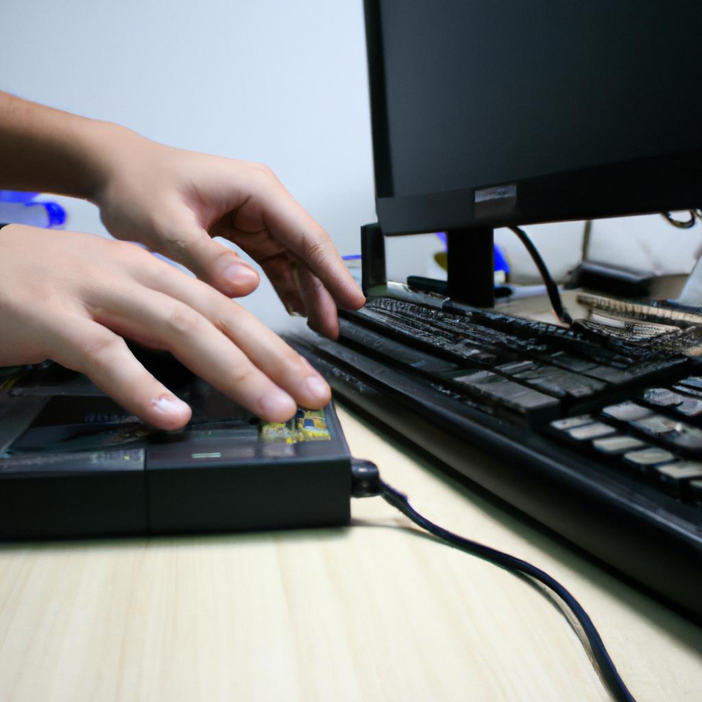 Person working with computer equipment
