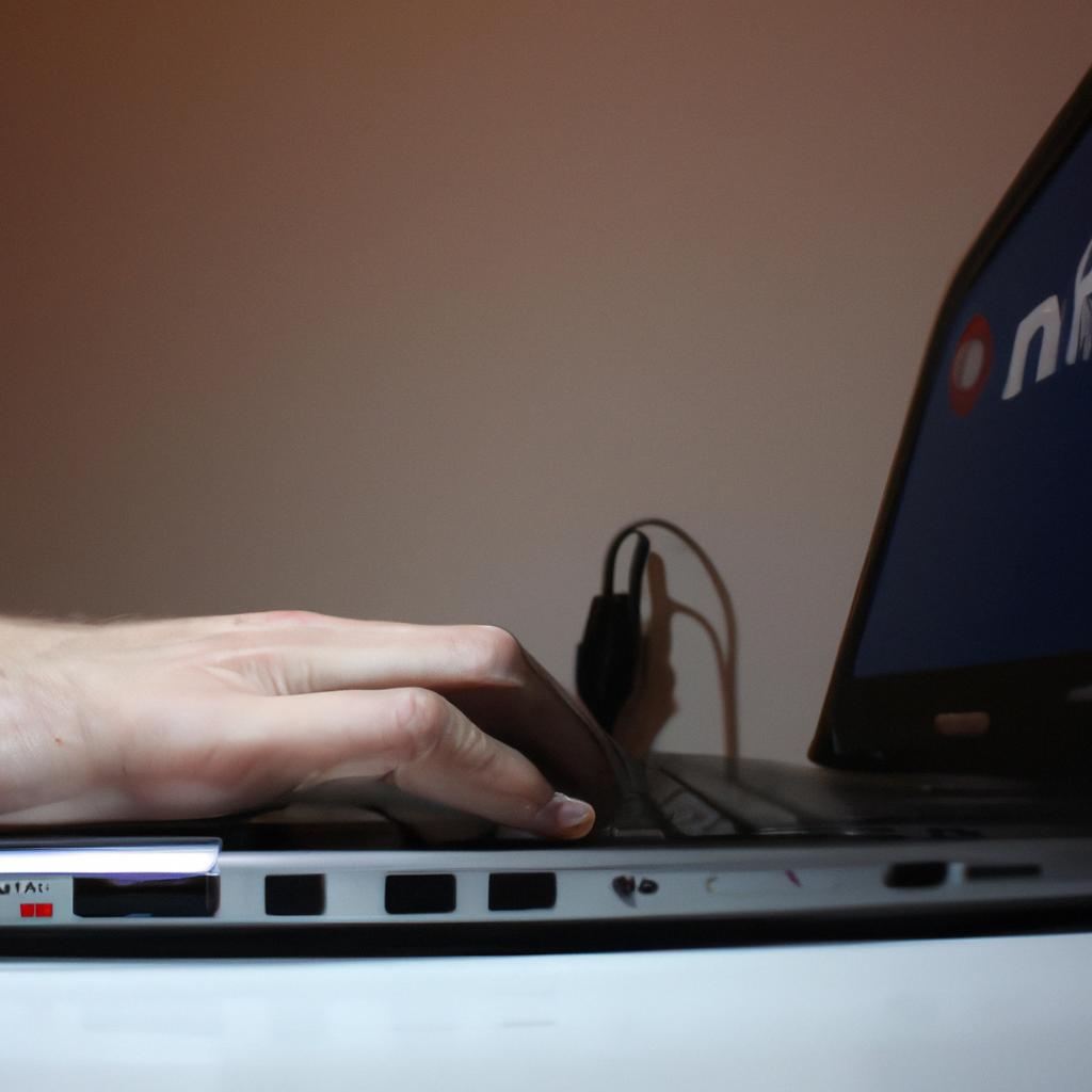 Person using laptop, seeking assistance